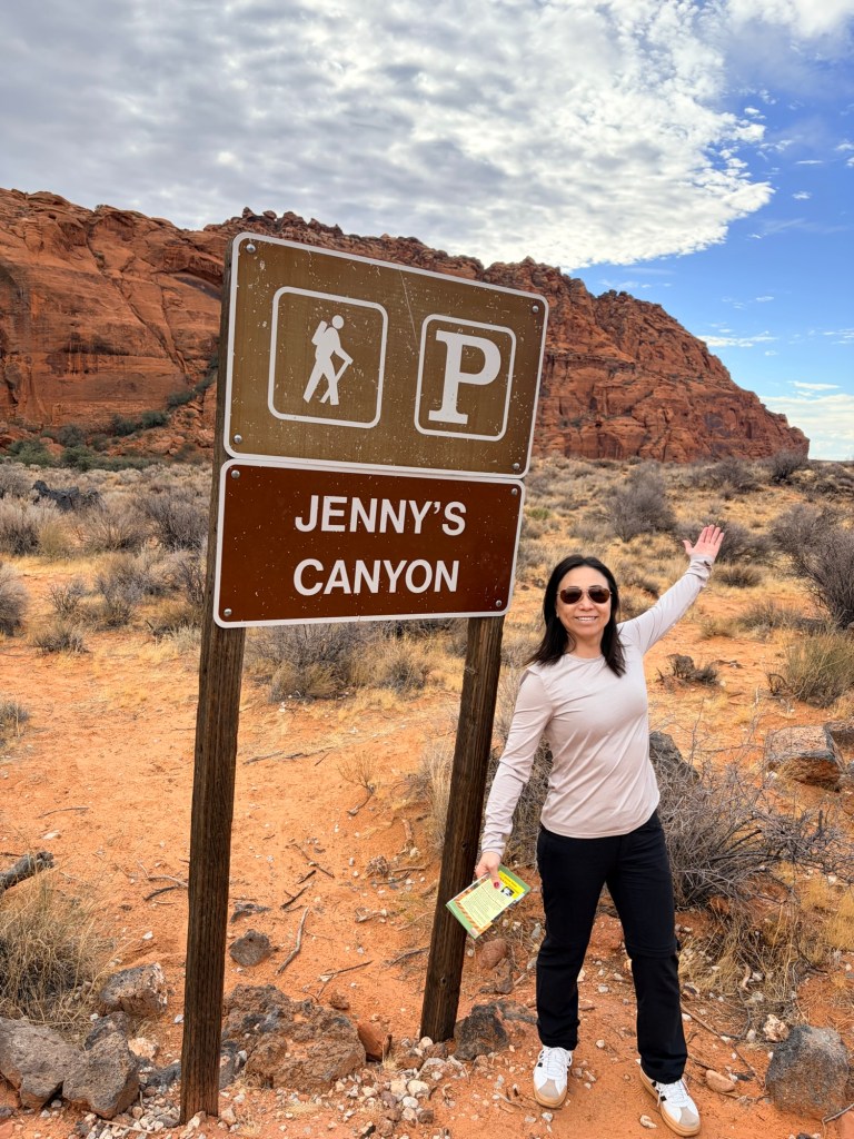 Jenny with the Jenny's Canyon sign